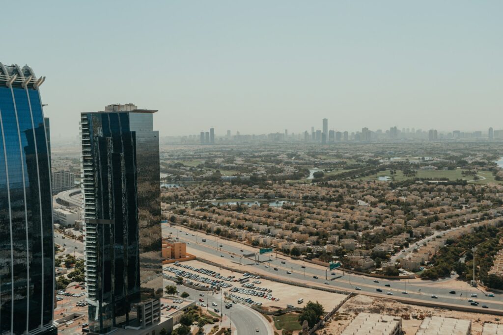 An aerial view of a city with tall buildings